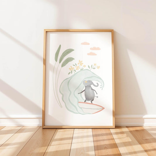 Cute nursery art print of a surfing elephant with a flower behind its ear, riding a wave with tropical leaves and flowers in the background.